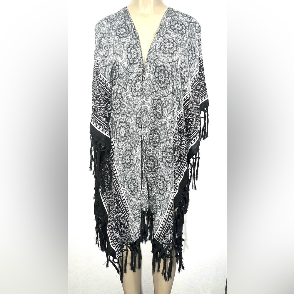 Steve Madden ruana is stylish in a fun bandana print.